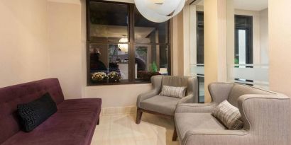 Lobby area at La Quinta Inn & Suites By Wyndham New York City Central Park.