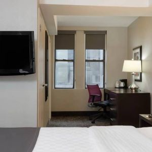 Day use room with work desk at La Quinta Inn & Suites By Wyndham New York City Central Park.
