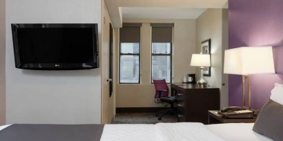 Day use room with work desk at La Quinta Inn & Suites By Wyndham New York City Central Park.