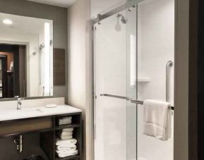 Guest bathroom with shower at Hilton Garden Inn Bel Air.