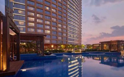 Relaxing outdoor pool at the Conrad Bengaluru.