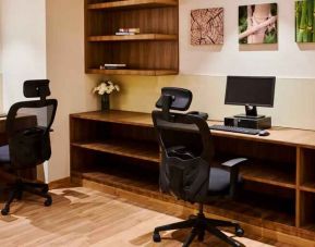 Business center with computers at the Hilton Garden Inn Lucknow.