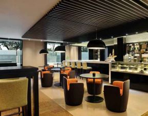Dining area suitable for co-working at the Hilton Bangalore Embassy GolfLinks.
