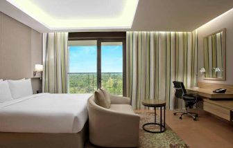 Comfortable hotel room at the DoubleTree Suites by Hilton Bangalore.