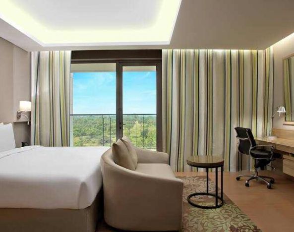 Comfortable hotel room at the DoubleTree Suites by Hilton Bangalore.