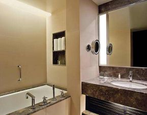 Guest bathroom at the DoubleTree Suites by Hilton Bangalore.