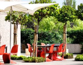 Outdoor patio perfect as workspace at the Hilton Madrid Airport.