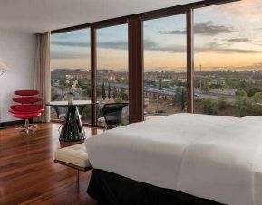 King bedroom with view at the Hilton Madrid Airport.