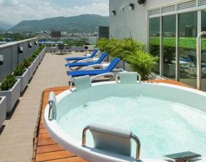 Terrace with pool at the Hampton by Hilton - Yopal.