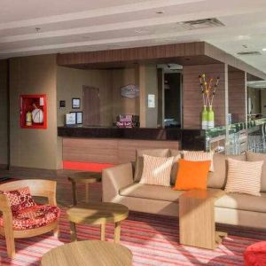 Bright lobby workspace at the Hampton by Hilton - Yopal.