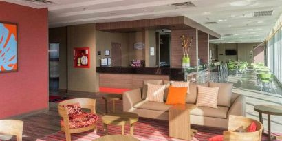 Bright lobby workspace at the Hampton by Hilton - Yopal.