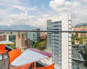 Outdoor terrace suitable as workspace at the Hampton by Hilton Medellin Antioquia.