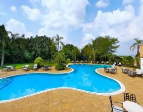 Relaxing outdoor pool area at the Hilton Sandton.