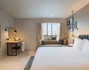 Hotel room with TV screen and desk at the Hilton Garden Inn Peterborough City Centre.