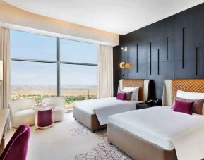 Twin room at the AlRayyan Hotel Doha, Curio Collection by Hilton.