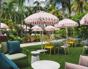 Outdoor patio suitable for co-working at the Hampton By Hilton Grand Cayman.