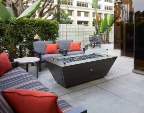 Outdoor patio suitable as workspace at Courtyard By Marriott Los Angeles LAX/Century Boulevard.