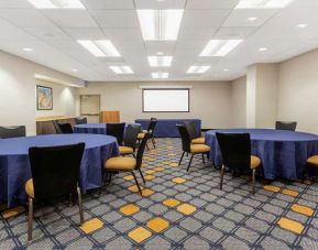 Meeting room with round tables at La Quinta Inn & Suites By Wyndham Chicago Downtown.