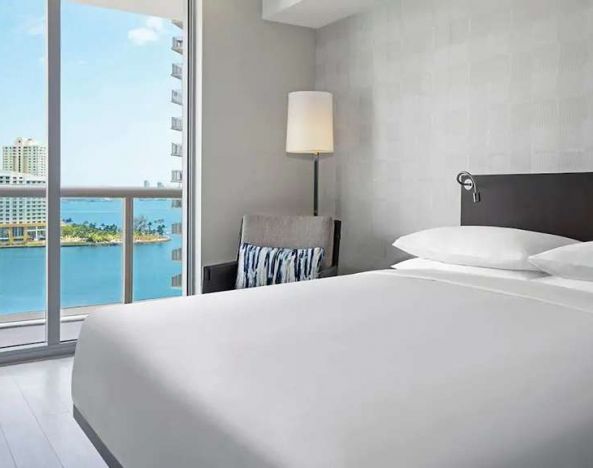 King bedroom overlooking the water at Hyatt Centric Brickell Miami.