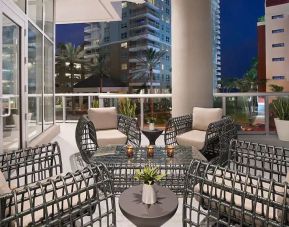Outdoor patio perfect as workspace at Hyatt Centric Brickell Miami.