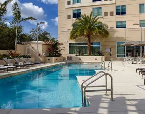 Relaxing outdoor pool at Hyatt Place Miami Airport East.