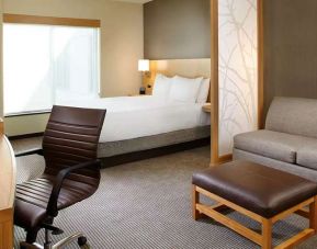 King bedroom room with workstation at Hyatt Place Miami Airport East.