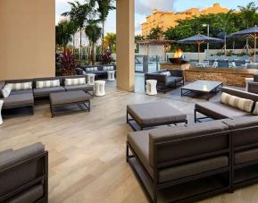 Outdoor patio perfect as workspace at Hyatt Place Miami Airport East.