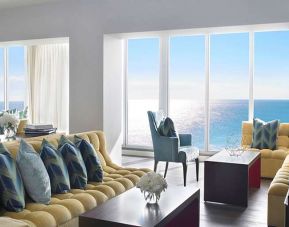 Beautiful living room with sea view perfect as workspace at Shelborne South Beach.