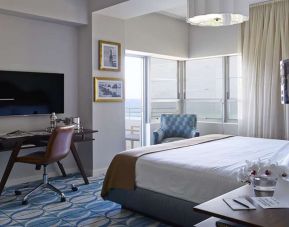 Hotel room with desk and balcony \at Shelborne South Beach.