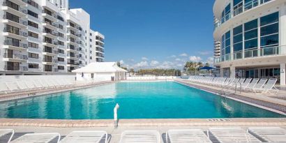 Relaxing outdoor pool at New Point Miami.