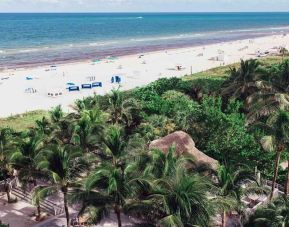 Beach in front of Cadillac Hotel & Beach Club, Autograph Collection.