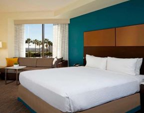 King bedroom with workstation at Residence Inn By Marriott LAX Airport.