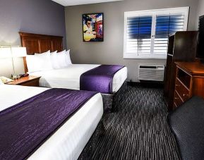 Hotel room with 2 queen beds at Best Western McCarran Inn.