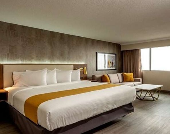 Comfortable king bedroom at Atlantica Hotel Halifax.