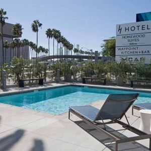 Refreshing outdoor pool at H Hotel Los Angeles, Curio Collection By Hilton.

