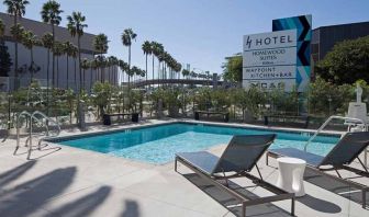 Refreshing outdoor pool at H Hotel Los Angeles, Curio Collection By Hilton.
