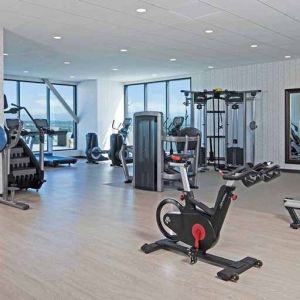 Fitness center available at H Hotel Los Angeles, Curio Collection By Hilton.
