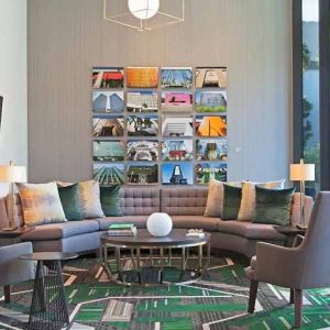 Lobby and coworking lounge at H Hotel Los Angeles, Curio Collection By Hilton.
