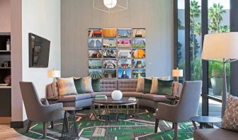Lobby and coworking lounge at H Hotel Los Angeles, Curio Collection By Hilton.
