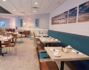 Spacious and comfortable dining and coworking space at Southbank Hotel Jacksonville Riverwalk.