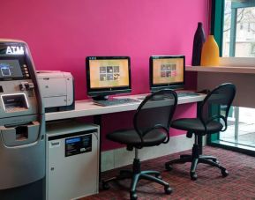 Well equipped business center with PC, internet, and printer at Courtyard By Marriott New York JFK Airport.