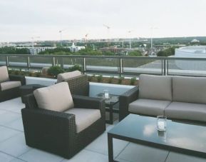 Pretty rooftop terrace with couches at Hyatt Place Washington D.C/National Mall.