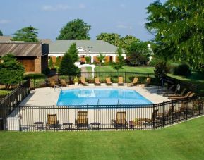 Large outdoor pool with sunbeds at Millennium Maxwell House Hotel Nashville.