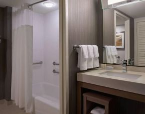 Guest bathroom with shower at Courtyard By Marriott Toronto Airport.