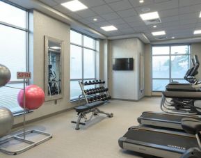 Fully equipped fitness center at Courtyard Edgewater NYC.