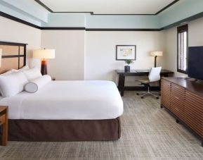 Spacious delux king room with TV and business desk at The Ambrose Hotel Santa Monica.