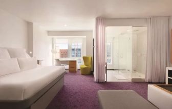 Lovely delux king room with work desk and private bathroom at Yotel Boston.