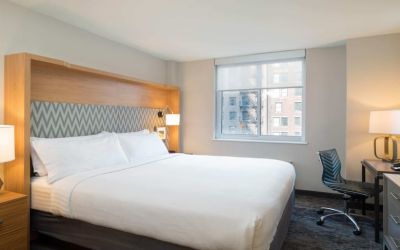 Lovely king bedroom with business desk at Holiday Inn Wall Street.