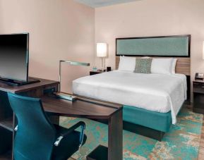 Spacious king suite with business desk and TV at Residence Inn Miami Beach Surfside.