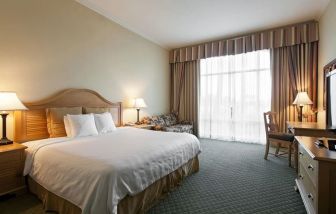 Lovely king suite with business desk at Monumental Hotel Orlando.
